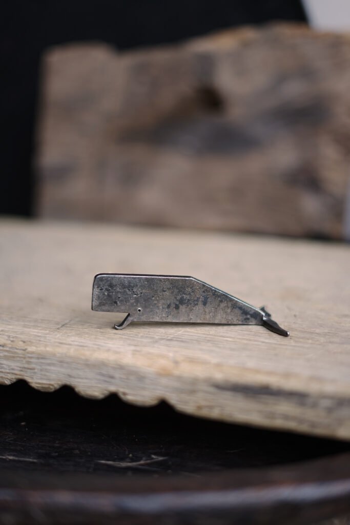 Whale bottle opener